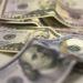 Dólar dispara com sinal de alta de juros