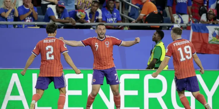 Escócia vence Haiti e vira líder do grupo do Brasil na Copa do Mundo