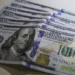 Dólar cai ao menor nível em três semanas; bolsa sobe 1,22%